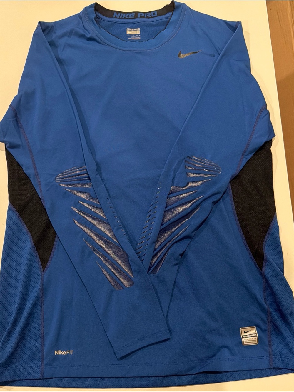 Nike Pro Combat Men's Long Sleeve Training Top in Royal Blue with Black Accents